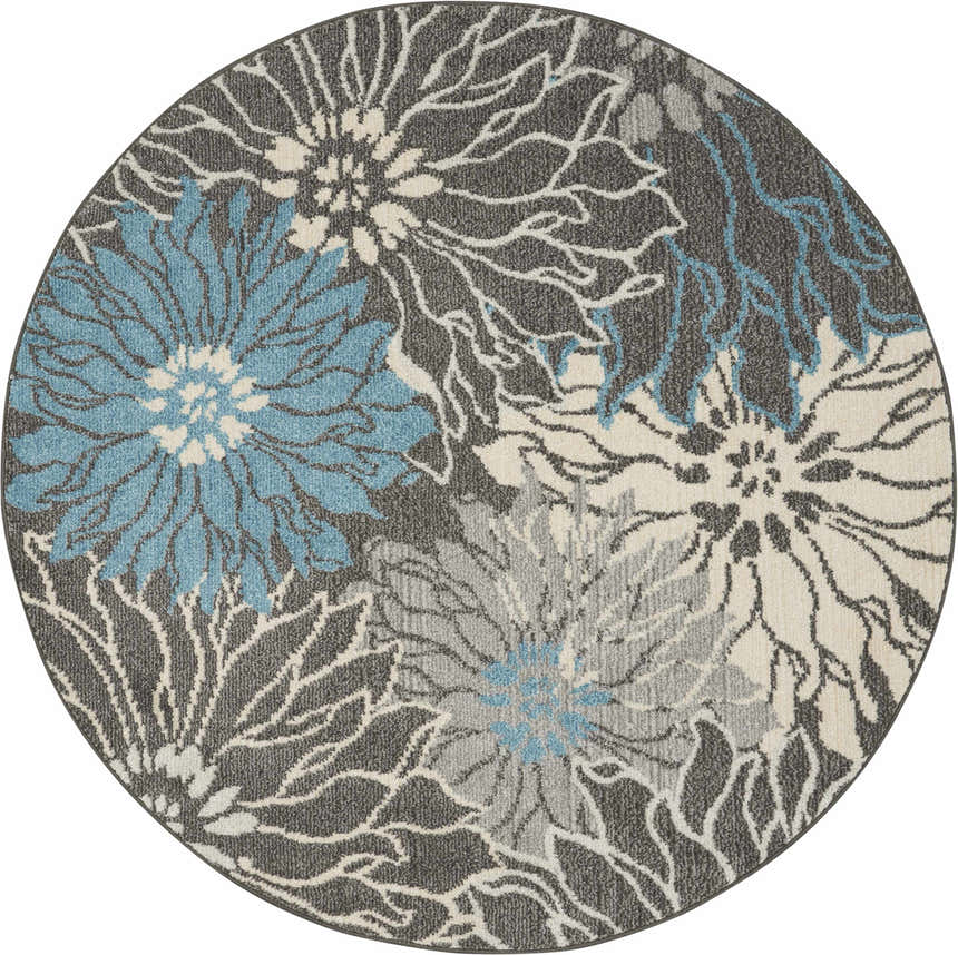 Close-up of round Nourison Passion Charcoal Blue rug. Floral pattern in taupe, gray, and blue on charcoal background.