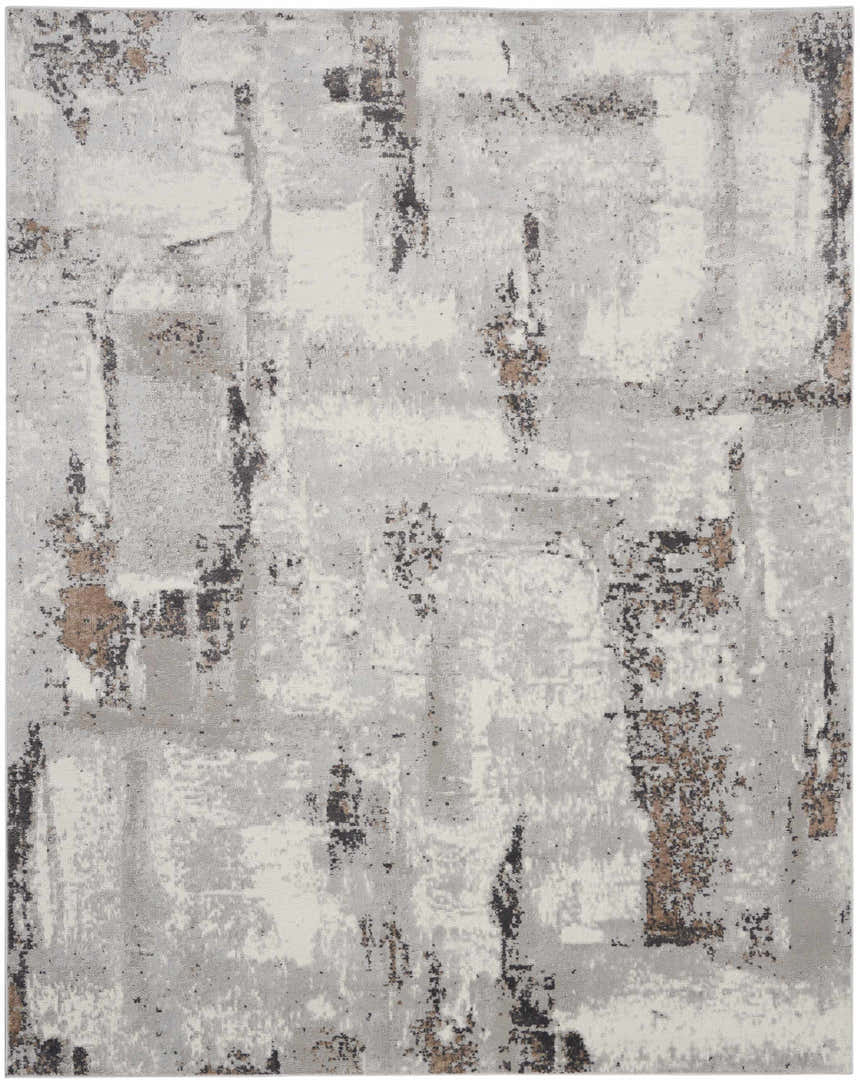 Close-up of the Nourison Elation Grey Ivory rug. Abstract design with chestnut accents, high pile texture, machine-made.