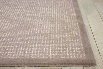 Close-up of the Nourison River Brook Grey Ivory rug showing its wool texture and mid-century modern pattern.