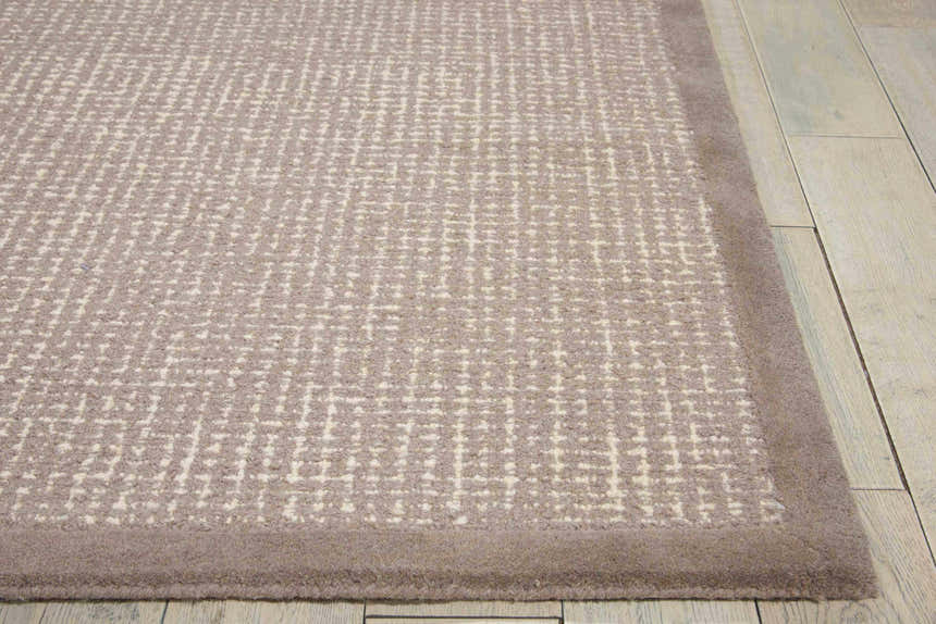 Close-up of the Nourison River Brook Grey Ivory rug showing its wool texture and mid-century modern pattern.