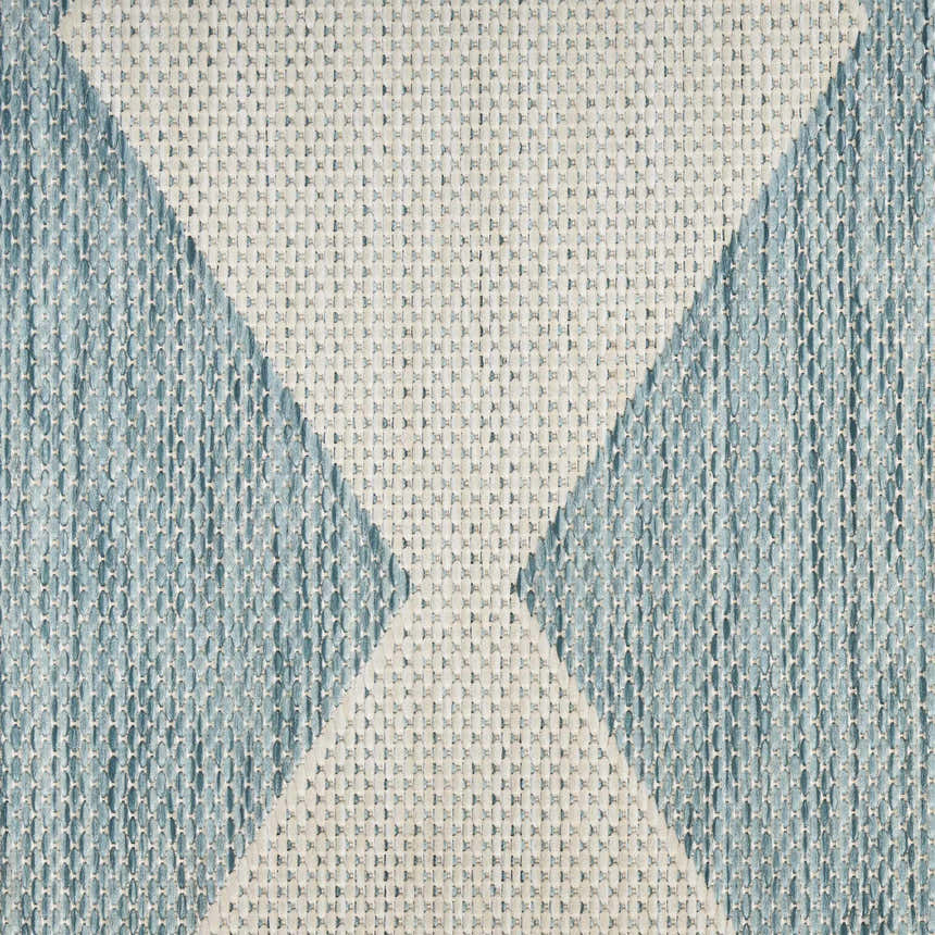 Close-up of the Nourison Positano Aqua Modern Area Rug featuring a geometric diamond pattern and woven texture.