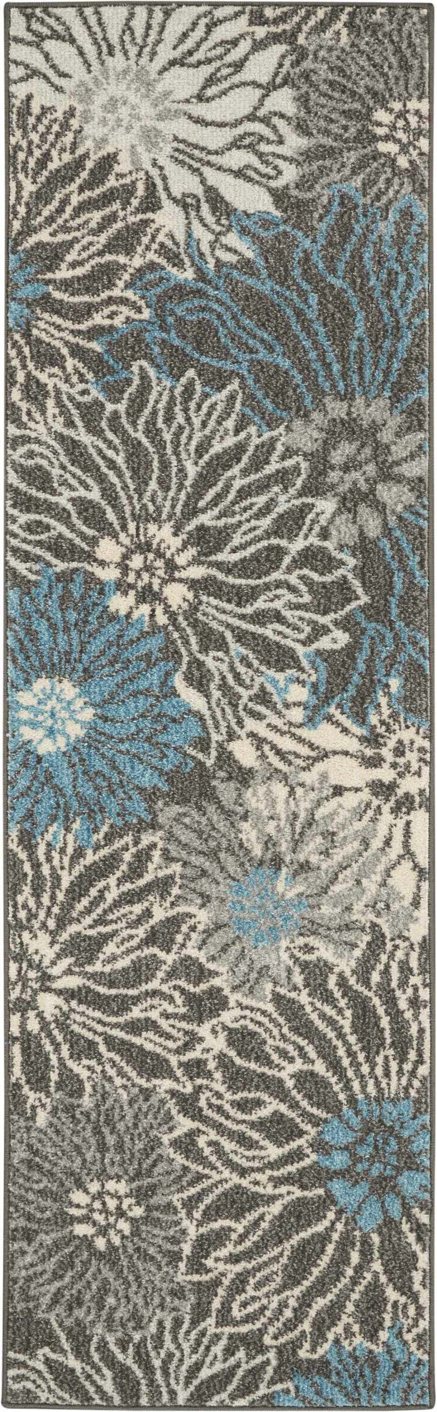 Close-up of Nourison Passion Charcoal Blue rug. Floral pattern in charcoal, blue, taupe, and gray tones. Contemporary style.