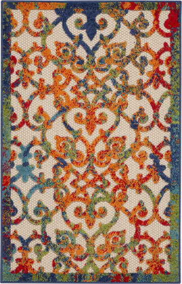 Close-up of Nourison Aloha Multicolor Outdoor Area Rug featuring a vibrant, ornate pattern in orange, blue, red, and green.