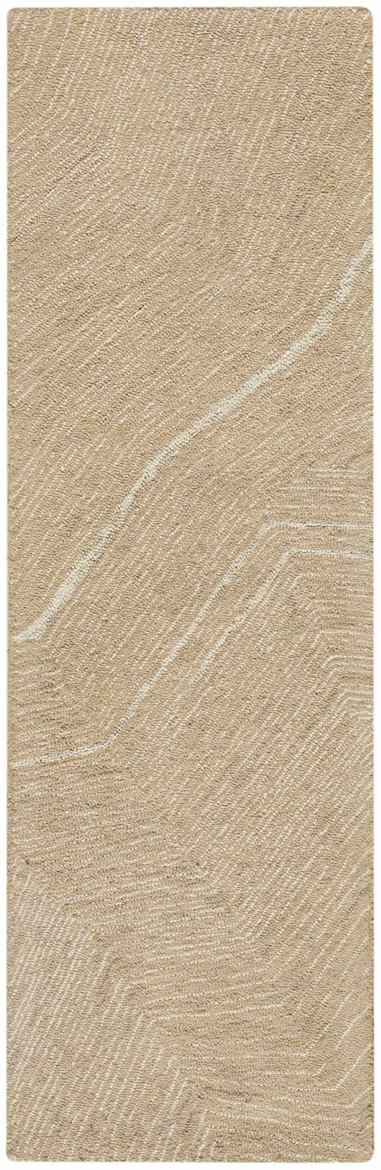 Close-up of the DKNY Pure Angles Camel rug. Handmade pile with a subtle, modern geometric pattern and neutral camel coloring.