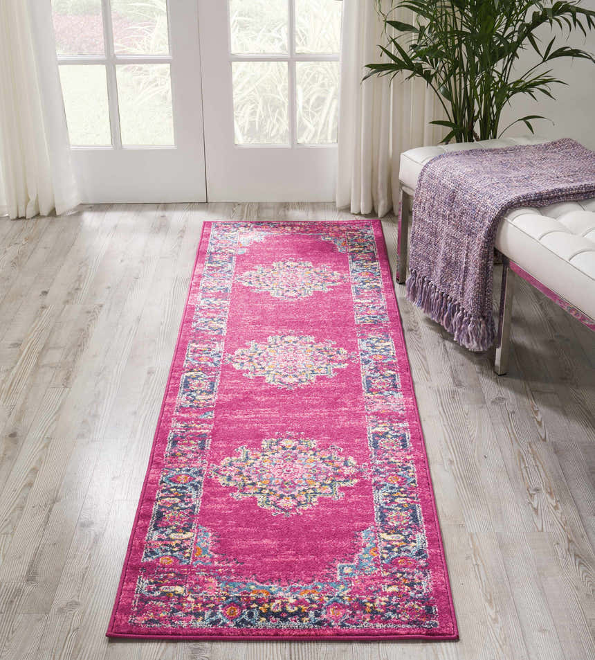 Entryway with a Nourison Passion Fuchsia runner rug, white bench, and wood floors. Bohemian style.