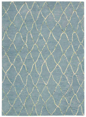 Close-up of the Barclay Butera Intermix Wave rug. Light blue wool with cream, green, and black diamond lattice pattern.