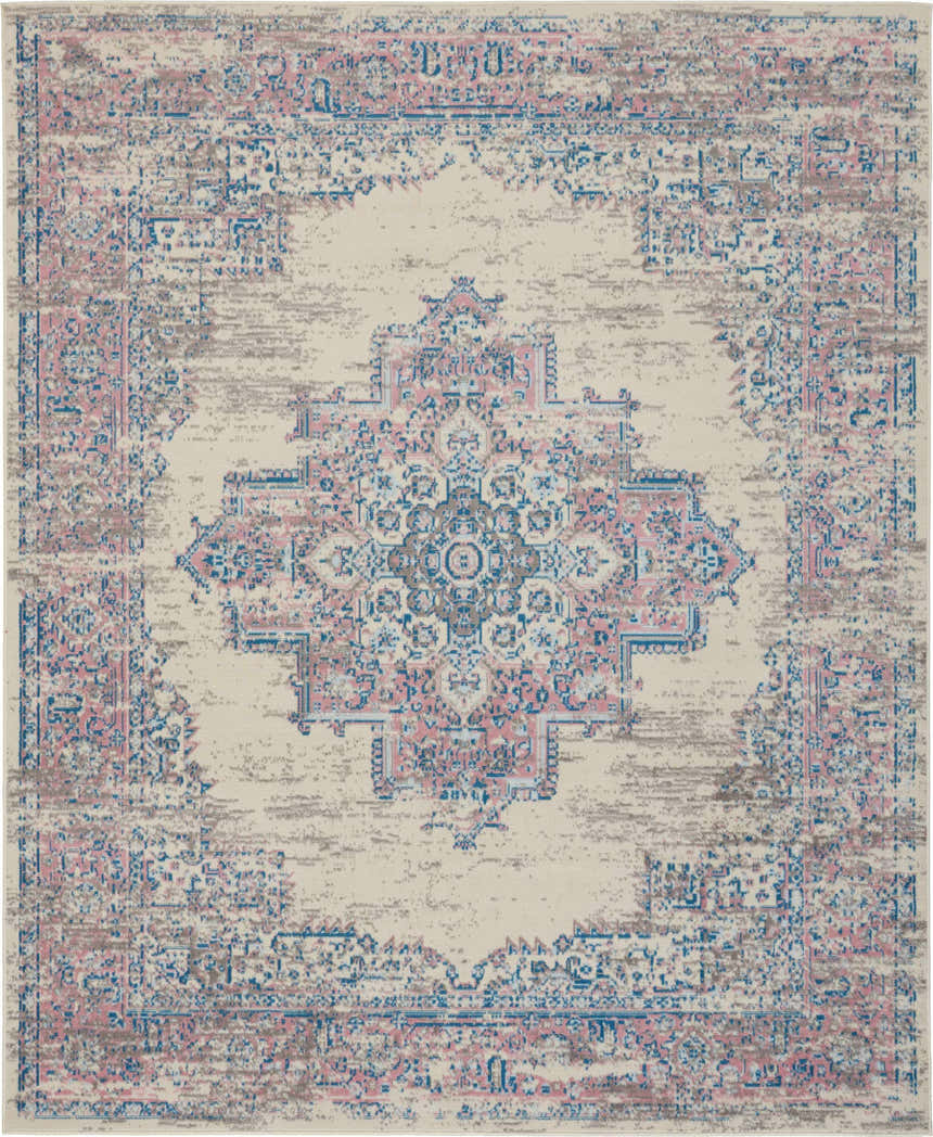 Close-up of the Nourison Grafix Ivory Pink Vintage Area Rug, featuring a faded traditional design in pink, blue, and chestnut tones.