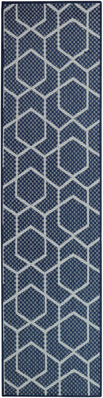 Close-up of Nourison Horizon Navy Modern Area Rug, featuring a geometric pattern. Navy and white color palette.