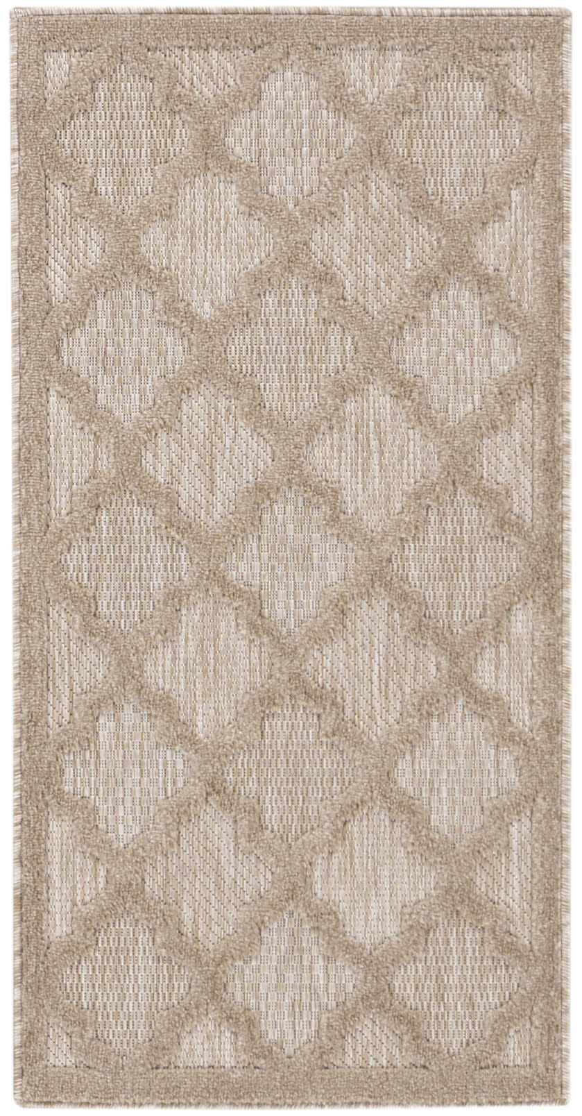 Close-up of Nourison Easy Care Natural Beige Area Rug; beige quatrefoil pattern on a textured, neutral background.