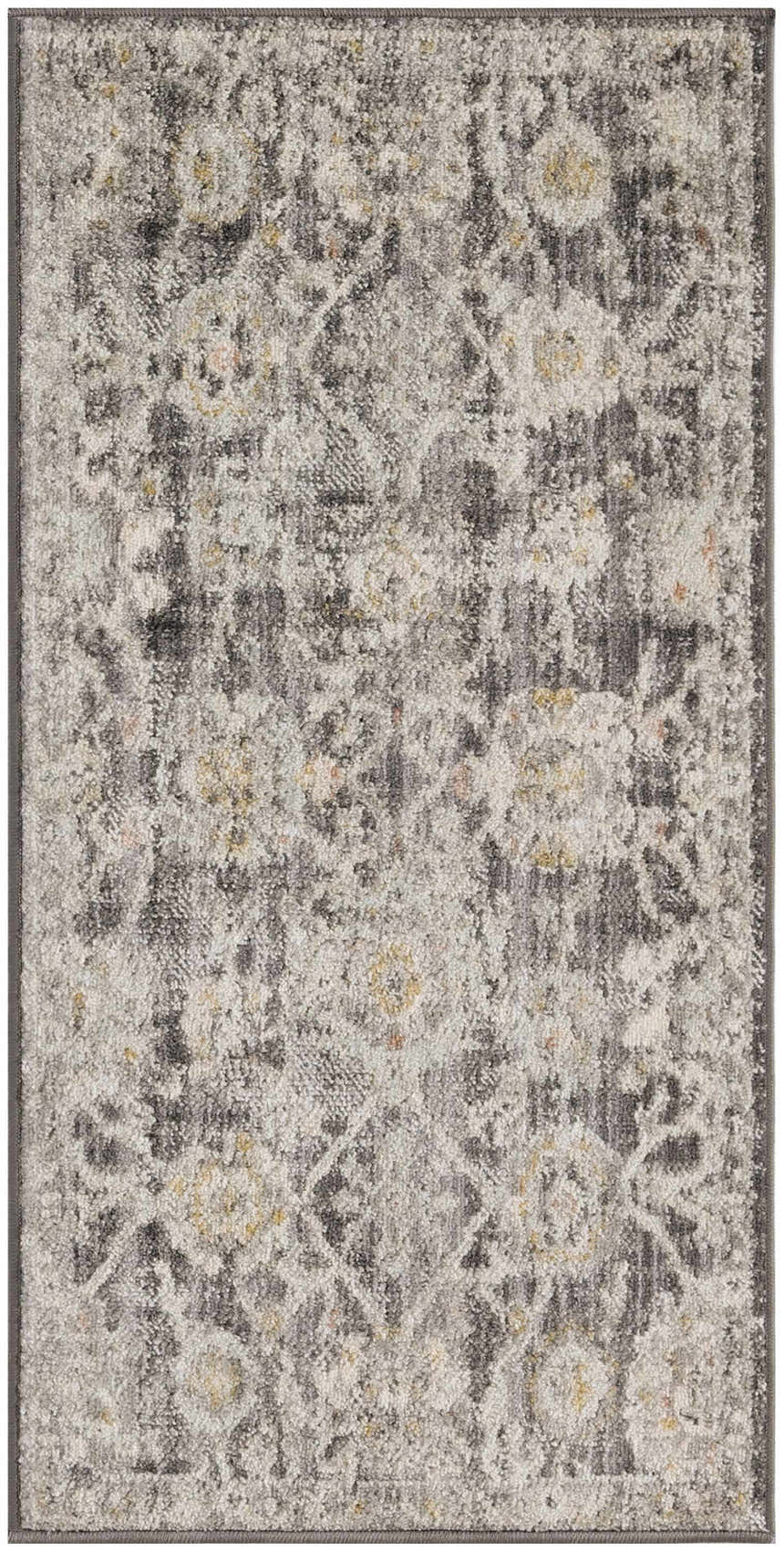Close-up of Nourison Oushak Home Charcoal Vintage Area Rug, featuring a taupe, distressed floral pattern and soft texture.