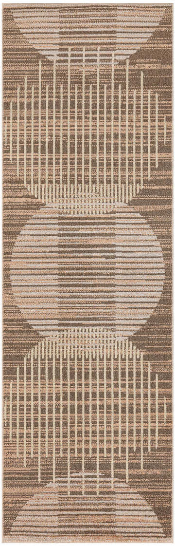 Close-up of the Latte Nourison Astra Rug. Mid-century modern design with circles and lines in brown and beige tones.