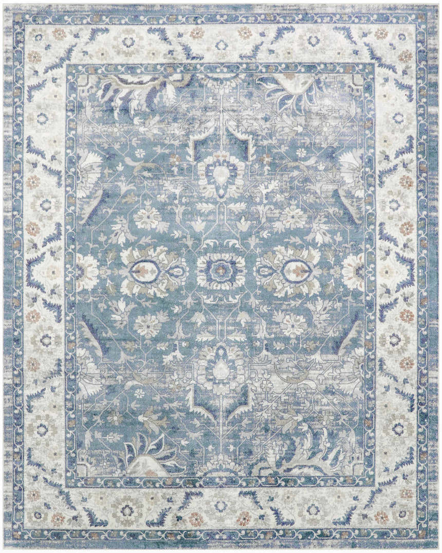 Detailed floral pattern of the Nourison Astra Blue Vintage Washable Area Rug. Light blue, vintage style.