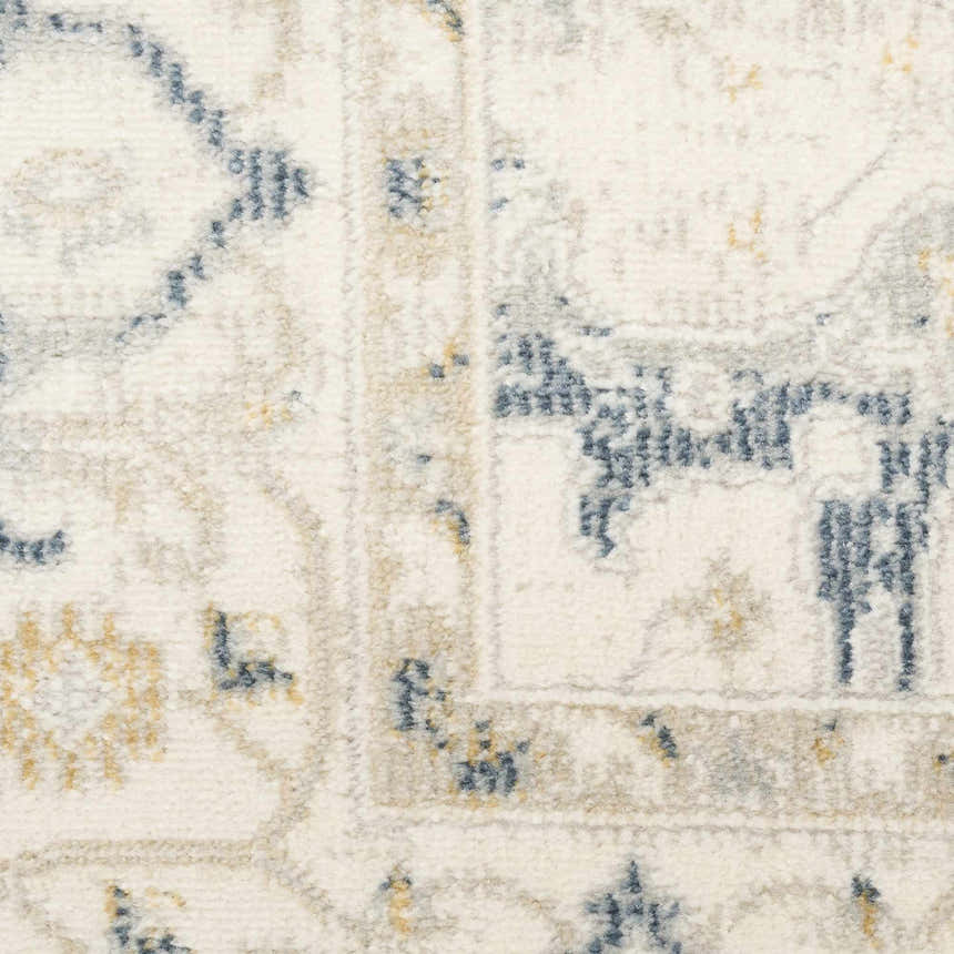 Close up of the high pile Nourison Pardis Light Blue Vintage Area Rug, showing texture and pattern.