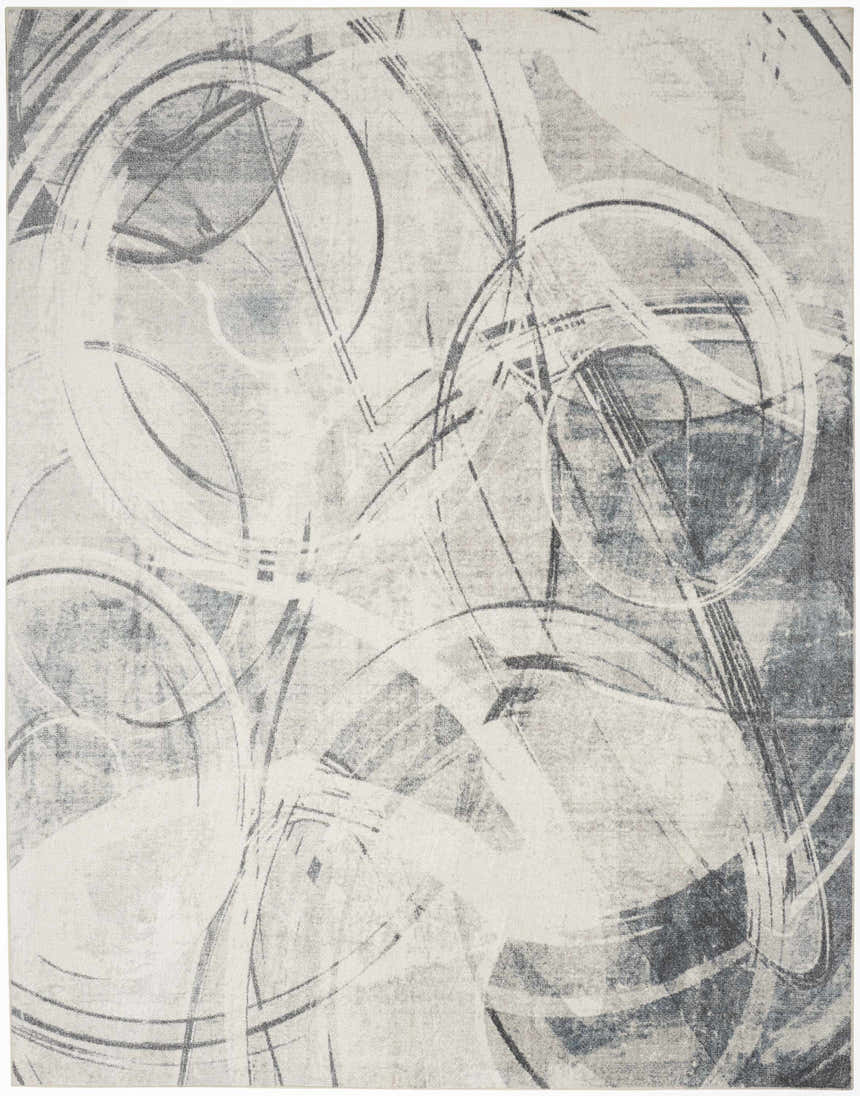 Close-up of the Nourison Astra Silver Blue Rug featuring a modern abstract design with gray circles and lines.