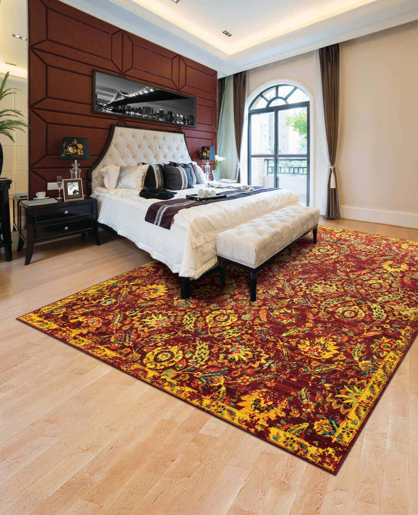 Elegant bedroom with Nourison Timeless Pomegranate Persian rug, tufted headboard, and natural light.