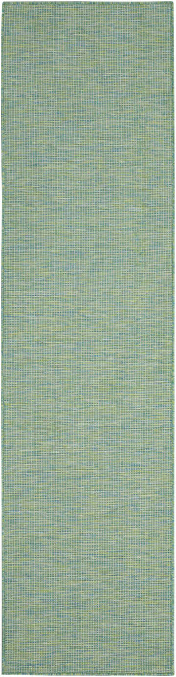 Close-up of the Nourison Positano Blue Green rug, featuring a textured, woven design in shades of blue, green, and cream.