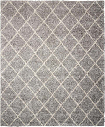 Close-up of the Nourison Brisbane Ash Shag Indoor Area Rug, featuring a diamond pattern and soft, textured shag pile.