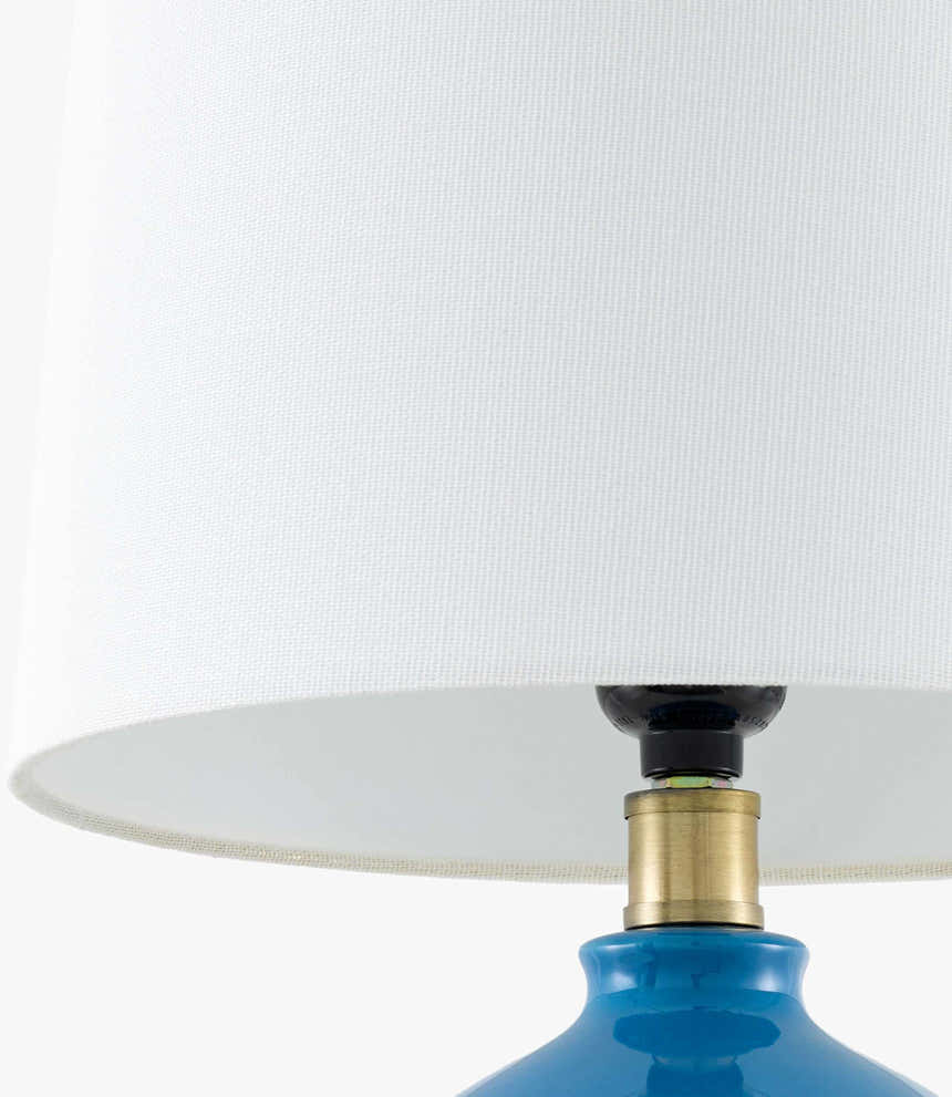 Sapphire Blue Modern Table Lamp with global details for bedside or console tables
