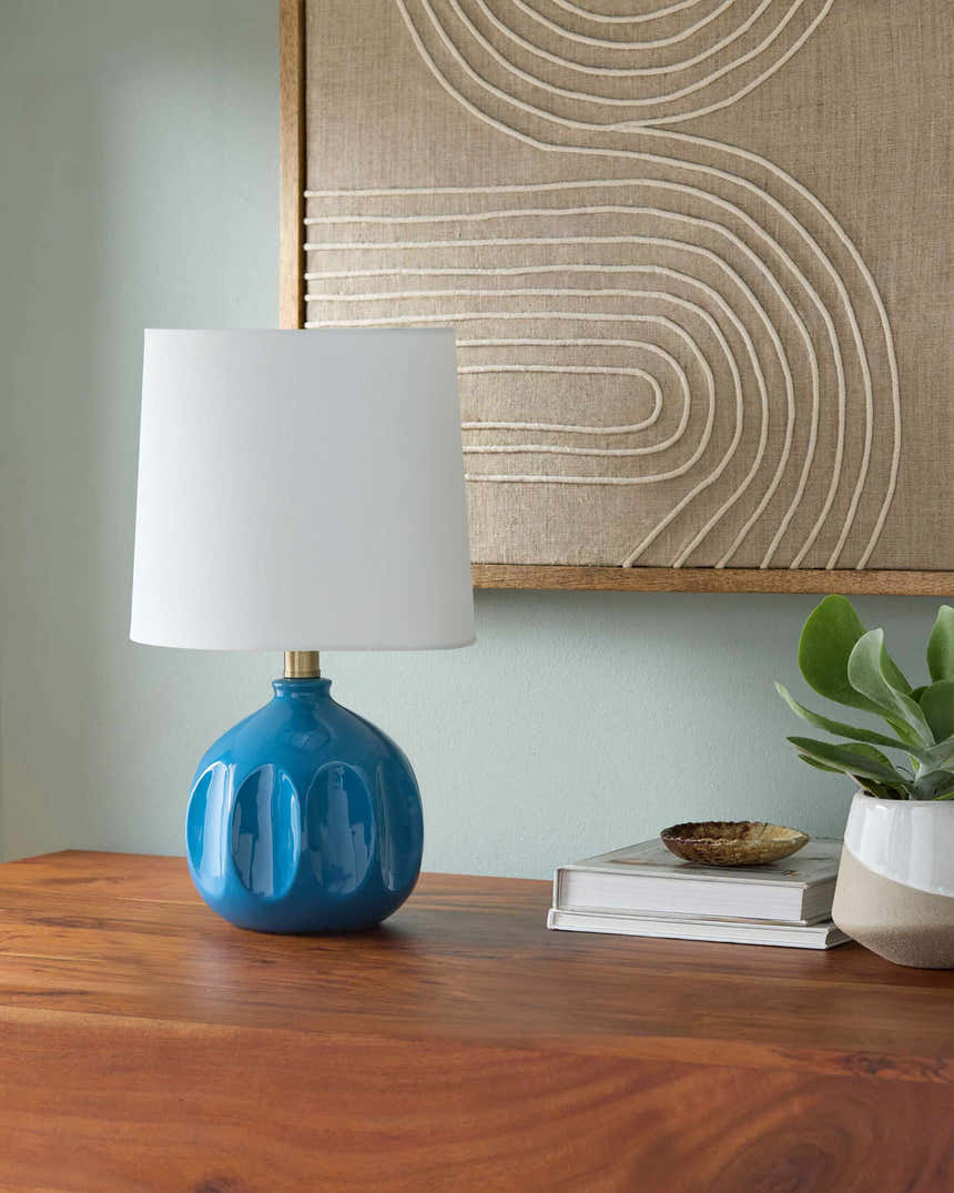 Sapphire Blue Modern Table Lamp with global details for bedside or console tables