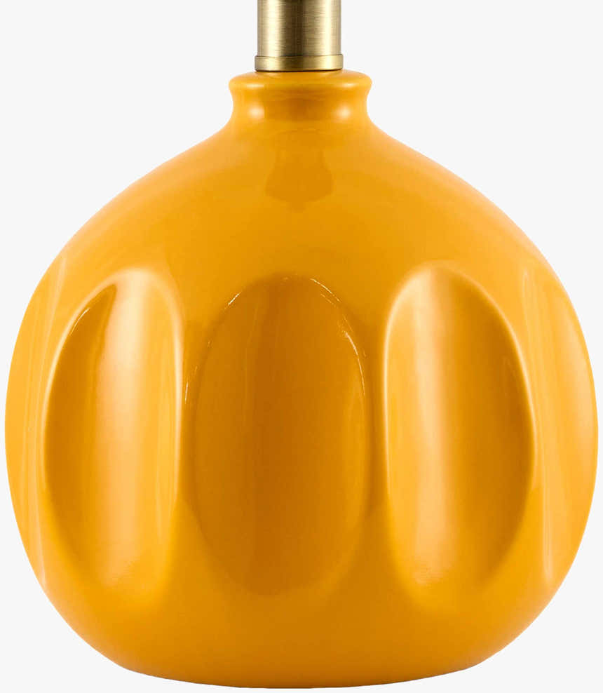 Soft Orange Modern Table Lamp with global details for bedside or console tables