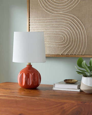 Brick Red Modern Table Lamp with global details for bedside or console tables