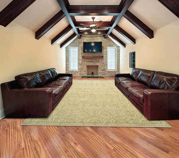 Living room scene with brown leather sofas and Nourison Regal Gravel Persian rug.