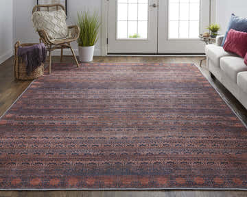 Living room with Feizy Voss Transitional Oriental rug in red, brown, and blue. Farmhouse style with sofa, chair, and wood floors. Roomscene-Rectangle