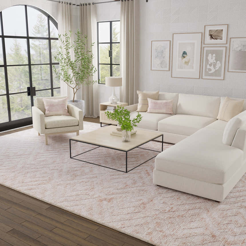 Living room with a Feizy Colton Modern Diamond Pink/Ivory Area Rug, white sofa, chair, and natural light. Roomscene-Rectangle