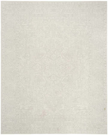 Close-up of the Nourison Grace Ivory Light Grey rug, showcasing its vintage style, subtle chestnut color, and intricate pattern.