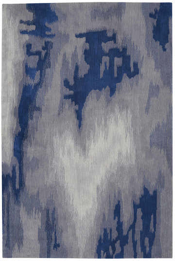 Close-up of the Nourison Symmetry rug; a modern design in shades of gray and blue with an abstract, textured pattern.