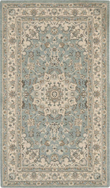 Close-up of the Nourison Living Treasures Aqua Ivory rug. Farmhouse style with chestnut accents and floral medallion design.
