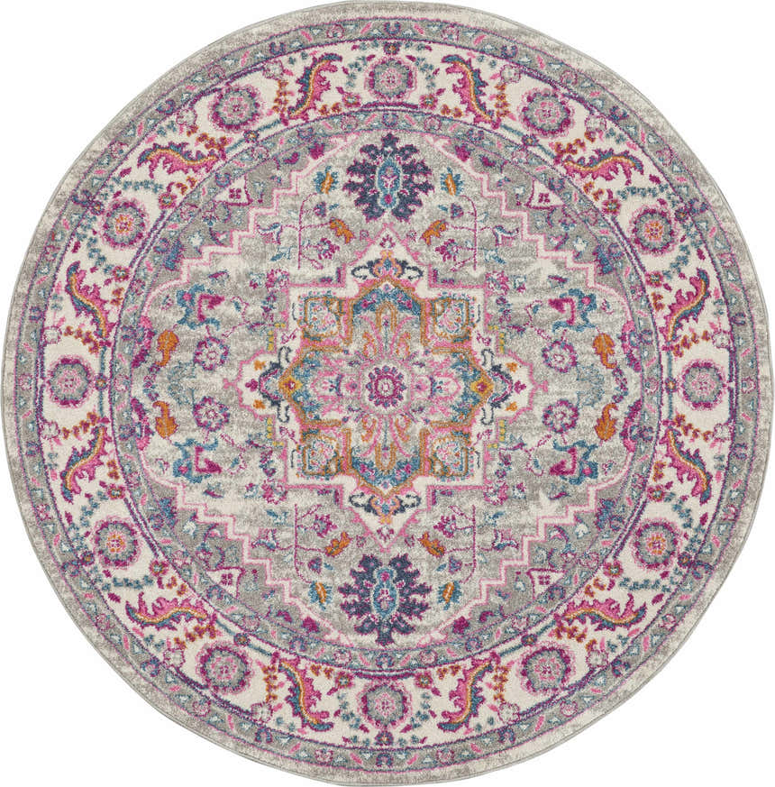 Detailed round Nourison Passion area rug in light gray and pink with a bohemian-inspired floral medallion pattern.