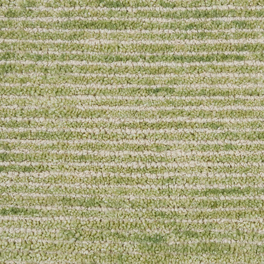 Close-up of the Nourison Weston Citron Rug. Features a textured, striped pattern in shades of citron and cream.