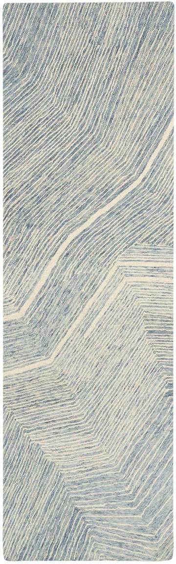 Close-up of DKNY Pure Angles Ivory Blue Rug. Modern design with blue and ivory geometric pattern.