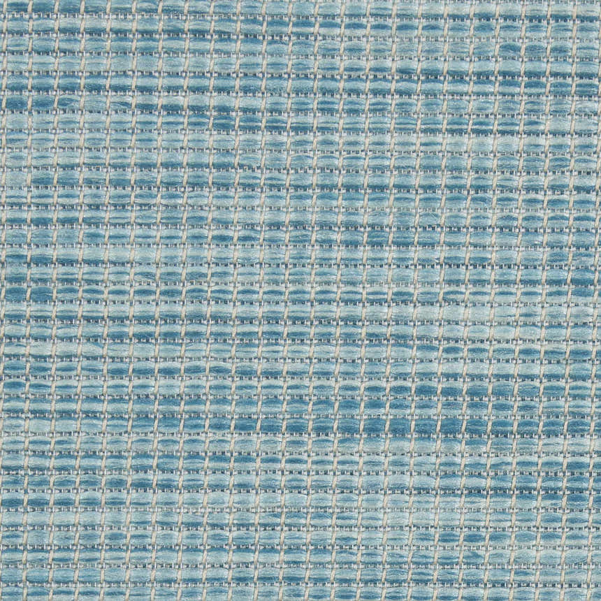 Close-up of the Nourison Positano Aqua Modern Area Rug showing its woven texture and blue color variations.