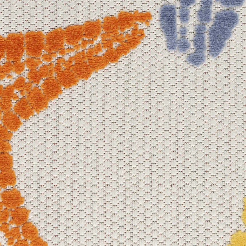 Close-up of Nourison Aloha Multicolor rug showing orange, blue, and yellow floral shapes on a textured, neutral background.