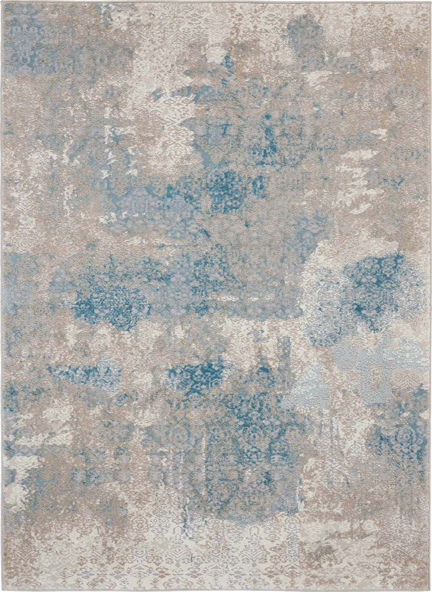 Close-up of Nourison Karma Ivory/Light Blue Vintage Area Rug, featuring a distressed chestnut, blue, and ivory pattern.