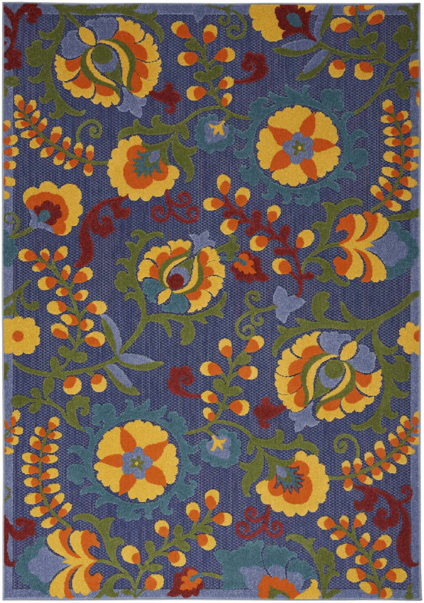 Close-up of Nourison Aloha Navy Multicolor outdoor rug with floral pattern in yellow, orange, green, and blue.