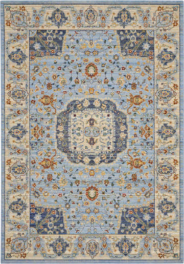 Close-up of the Nourison Majestic Light Blue rug. Farmhouse style with floral patterns in light blue, navy, beige, and rust colors.