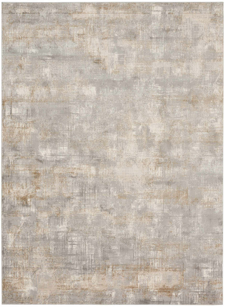 Close-up of the Calvin Klein CK950 Rush rug. Gray and beige high pile with a modern, abstract pattern and subtle texture.