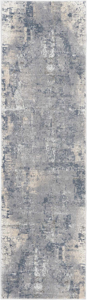 Close-up of the Nourison Rustic Textures Grey Beige rug, showing its distressed, mid-century modern design and textured weave.