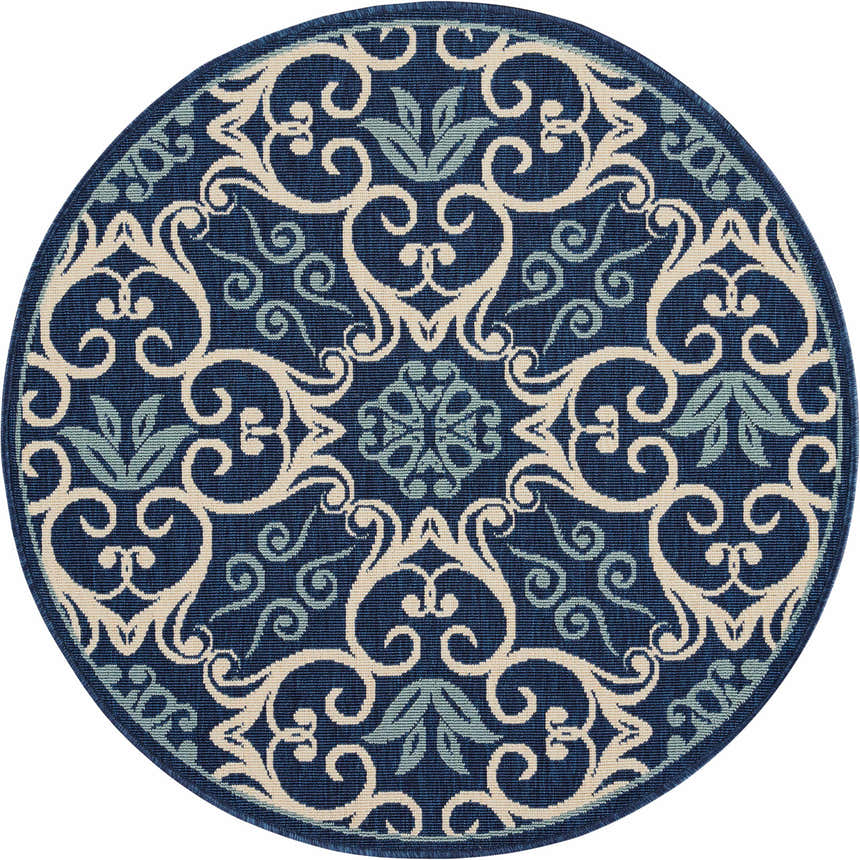 Round Nourison Caribbean Navy rug with a contemporary floral and scroll pattern in navy, cream, and light blue.