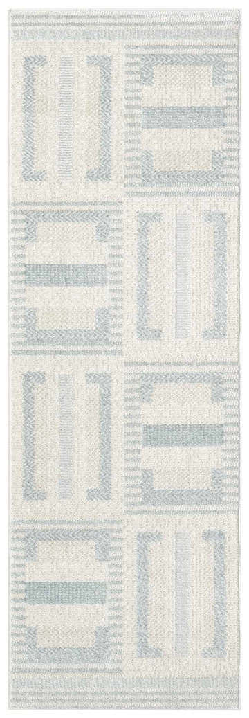 Close-up of Nourison Nordic Ivory Blue rug. Modern design with geometric chestnut accents and textured pile.