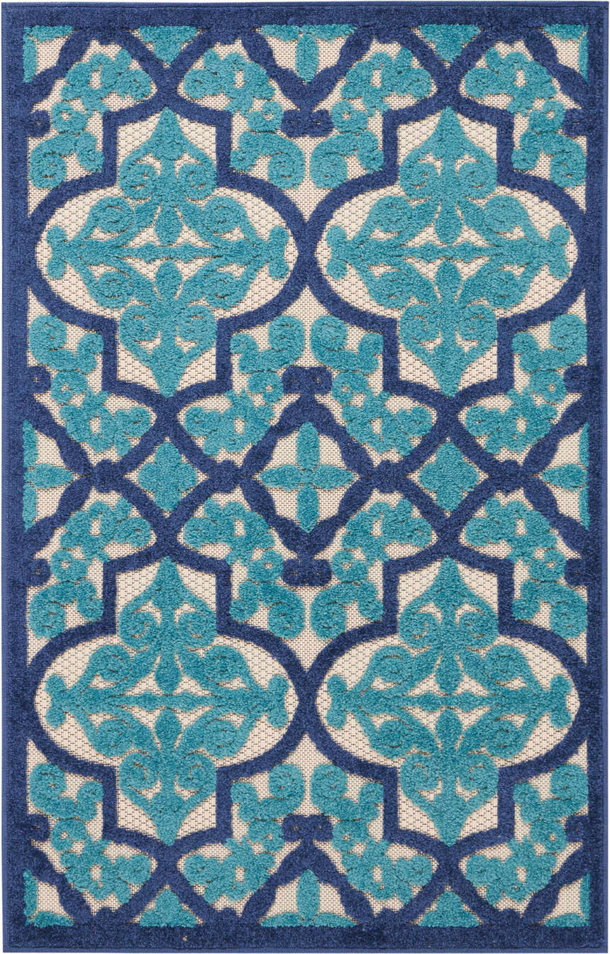 Close-up of the Nourison Aloha Navy Bohemian Area Rug featuring a navy and turquoise floral trellis pattern.