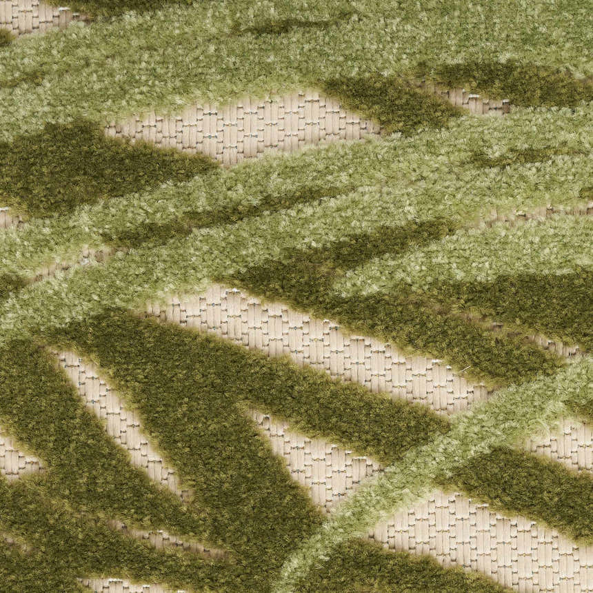 Close-up of the Nourison Aloha Ivory Green Outdoor Area Rug featuring a textured green geometric design.