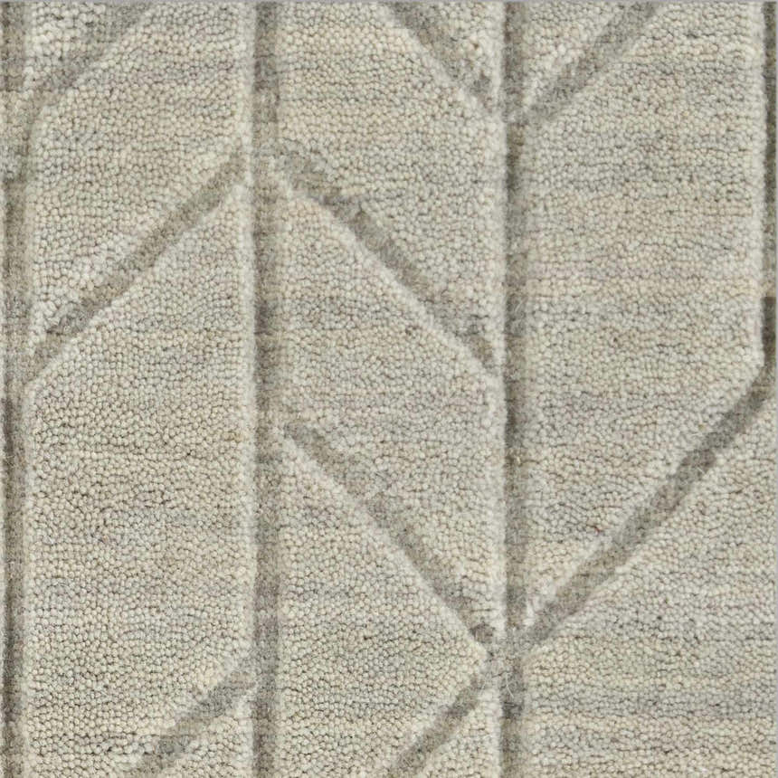 Close up of the Nourison Alessia Sage rug. Muted sage wool with a geometric, textured design.