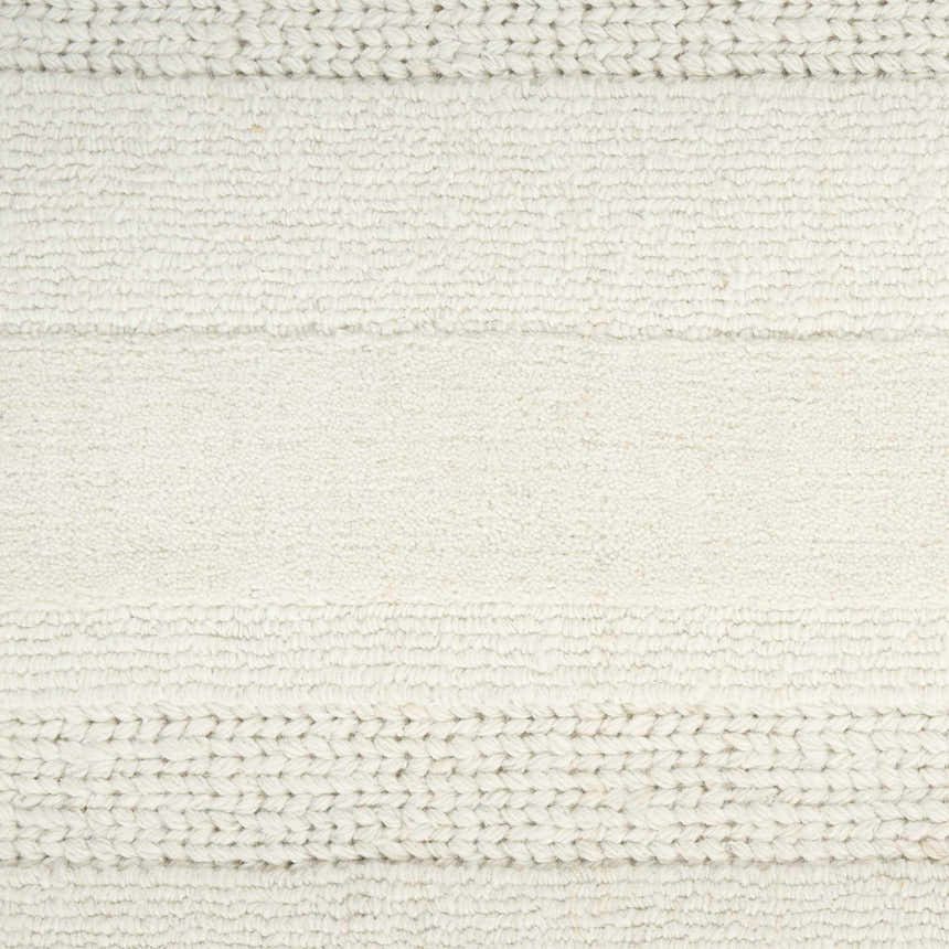 Close-up of the DKNY Pure Multi Weave Ivory Rug, showing texture and woven details.