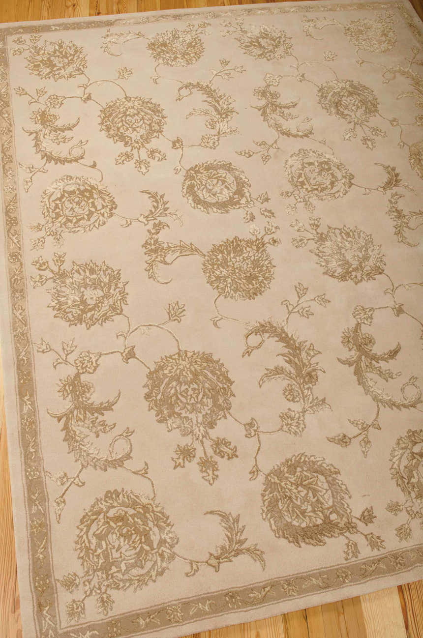 Close-up of the Nourison Regal Sand Persian rug, featuring a floral design in sandstone on a cream background.