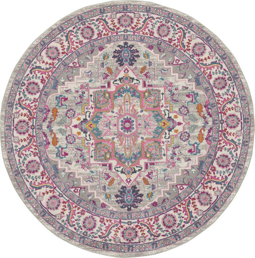 Close-up of round Nourison Passion Light Grey Pink rug. Bohemian style with floral and geometric patterns in pink, gray, and blue.