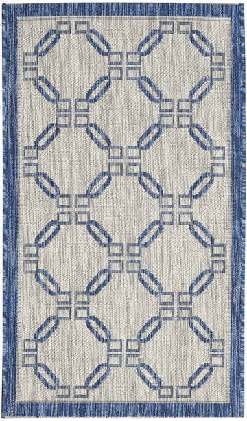 Close-up of the Nourison Country Side Ivory Blue rug, featuring a geometric trellis pattern and textured weave.